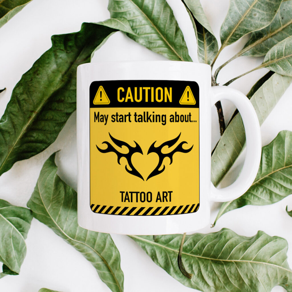 White Mug with Tattoo Art Caution Sign Design